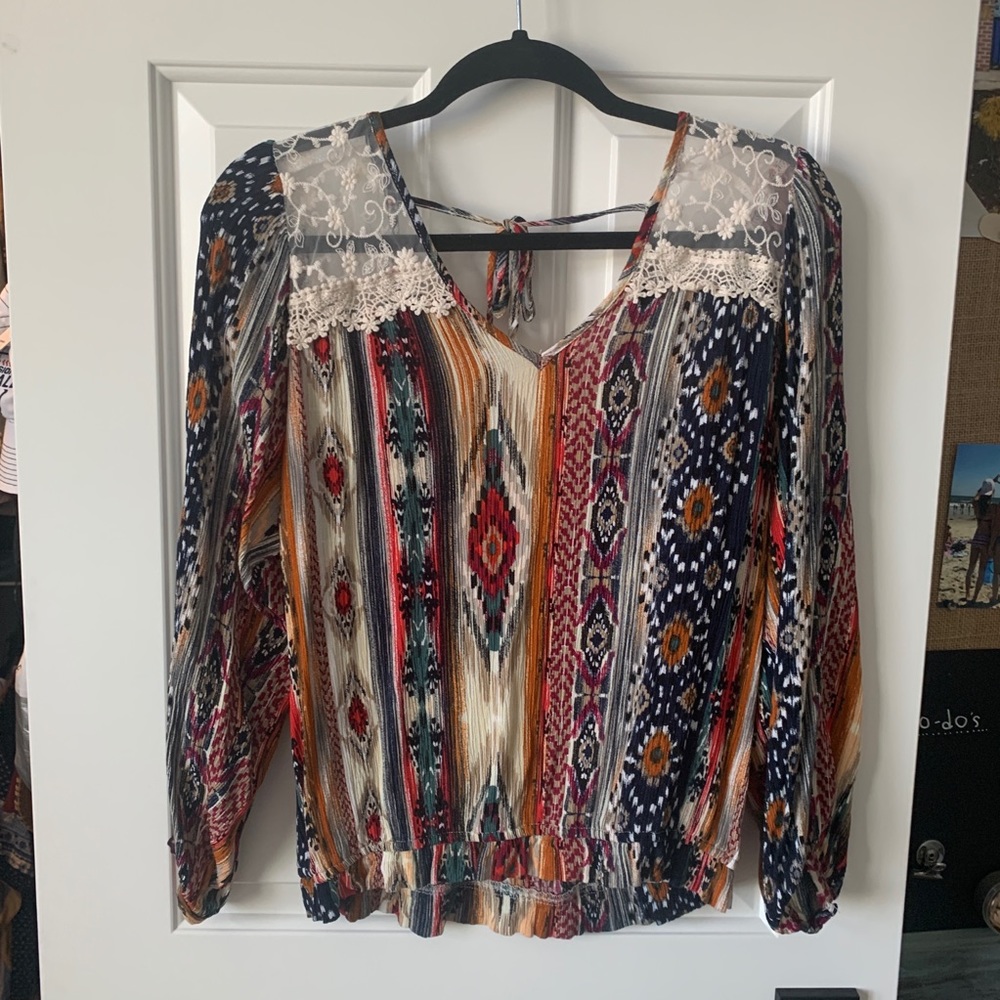 Whimsical and fun patterned long-sleeve blouse